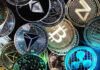 Various cryptocurrency coins with different symbols displayed