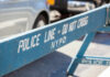 Blue NYPD barricade with Police Line - Do Not Cross.