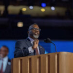 Mayor’s Shocking Priorities After Student’s Murder A man speaking at a podium with microphones