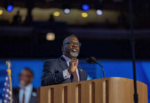 Mayor’s Shocking Priorities After Student’s Murder A man speaking at a podium with microphones