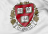Harvard University crest on a white background