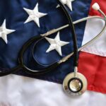 A stethoscope resting on an American flag