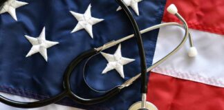 A stethoscope resting on an American flag