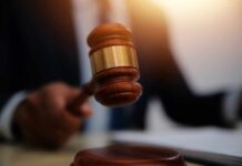 Federal Court STUNS: Teens Go Down for Cartel Hit A gavel being struck on a desk in a courtroom setting