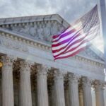 Supreme Court Blocks Democrats’ District Rigging Scheme The Supreme Court building with an American flag waving in front