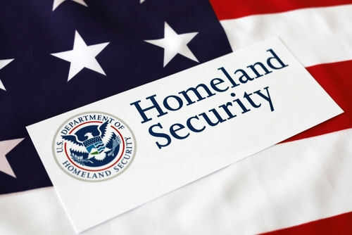 Homeland Security sign on American flag background