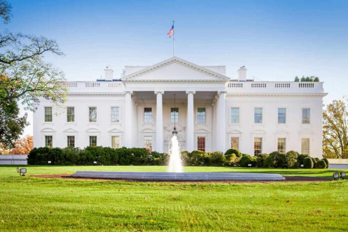 The White House with lawn and fountain.