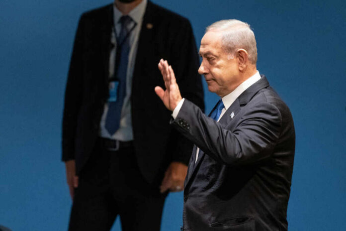 Benjamin Netanyahu leaves after_2365708563.jpg I dont know who this person is waving