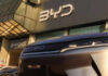 Economic War: U.S.-China Tensions Escalate Over EVs Car dealership with BYD logo and vehicles displayed