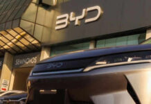 Economic War: U.S.-China Tensions Escalate Over EVs Car dealership with BYD logo and vehicles displayed