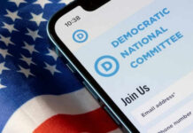Phone screen displaying Democratic National Committee website.