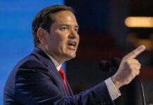 Rubio’s Bold Cuba Takedown: Green Card REVOKED! A politician passionately delivering a speech at a podium