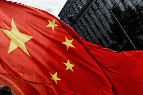 Prague,,Czech,Republic,-,March,,28th,2016:,Chinese,President,Xi Close-up of the Chinese flag waving in the wind