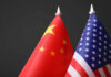 Chinese and American flags side by side.