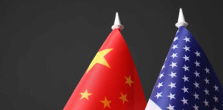 Chinese and American flags side by side.