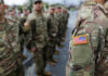 Washington Uses State Data to Automate Draft Registration Military personnel standing in formation outdoors