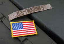 Marines’ Readiness Gamble Sparks Pentagon Jitters U.S. Marines patch and American flag patch.