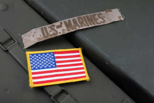 U.S. Marines patch and American flag patch.