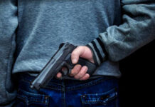 Supreme Court SLAPS Vague Gun Ban Person holding a handgun behind their back