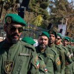 IRGC Hit At Home — Story Doesn’t Add Up Azadi Tower in Tehran with people gathered around it
