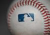 Florida AG Puts MLB On Notice Close-up of a baseball featuring the MLB logo