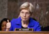 A senator giving a thumbs up during a hearing