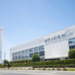 Starlink Swarm Grows — Who’s Really in Control? SpaceX headquarters with Falcon 9 booster displayed outside