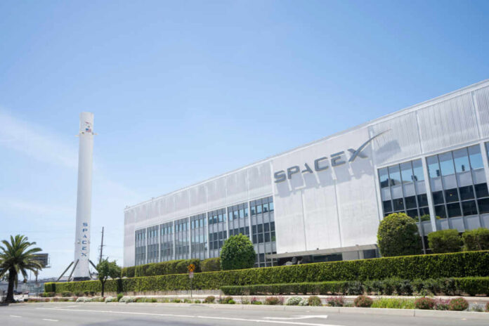 spacex-headquarters2409679507jpg SpaceX headquarters with Falcon 9 booster displayed outside