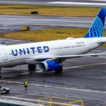 Seven-Hour Tarmac Nightmare — Outrage Erupts United Airlines Airbus A319 taxiing on a wet airport tarmac