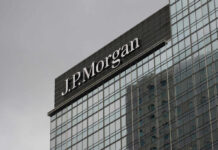 DEI Boss Caught — JPMorgan Drops The Hammer JP Morgan building with reflective glass windows