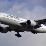 Leaked Memo: United Bends For Trump Critics? Commercial airliner approaching landing with landing gear down
