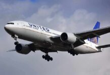Leaked Memo: United Bends For Trump Critics? Commercial airliner approaching landing with landing gear down