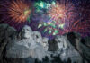 Sky Spies Over Suburbs—Fireworks Sting Escalates Fireworks exploding over Mount Rushmore at night