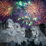 Fireworks exploding over Mount Rushmore at night