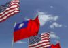 U.S. Warning Lands In Taipei: Move Or Regret Flags of the United States and Taiwan waving against a blue sky