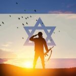 Survivor Torches NYC Mayor’s Genocide Claim silhouetted soldier saluting at sunset with star symbol overlay
