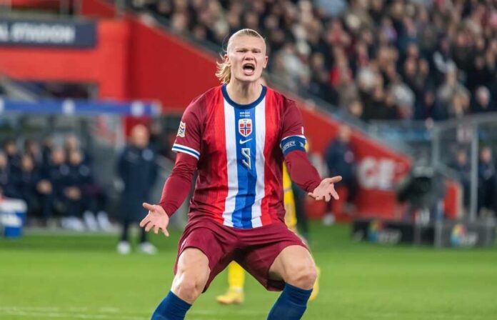 Oslo,,Norway,,November,17,,2024.,Norway,National,Football,Team Soccer player in Norway kit shouting with arms outstretched