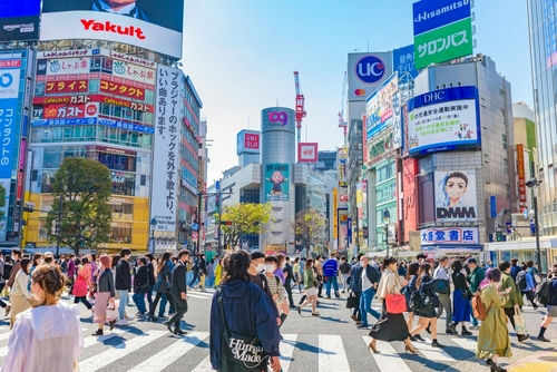 tokyo-japan-people2150588459 Crowded Shibuya crossing with colorful advertisements buildings