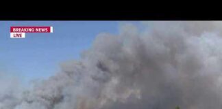 Evacuations in place for large wildfire burning quickly in northwest Spokane
