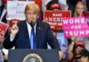 Bribe Bombshell? Or Just Backchannel 101? politician speaking at rally podium