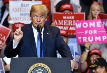 Bribe Bombshell? Or Just Backchannel 101? politician speaking at rally podium