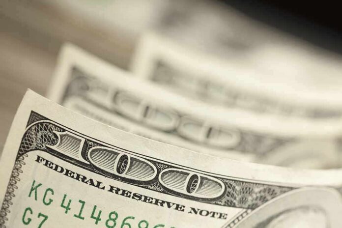 shutterstock_120456253 Stack of U.S. hundred dollar bills in close-up