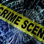 Boyfriend Bolts Abroad — Cuffed On Landing Crime scene tape over shattered glass