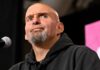 Blunt Check: Israel Isn’t America bald man with goatee speaking at a microphone