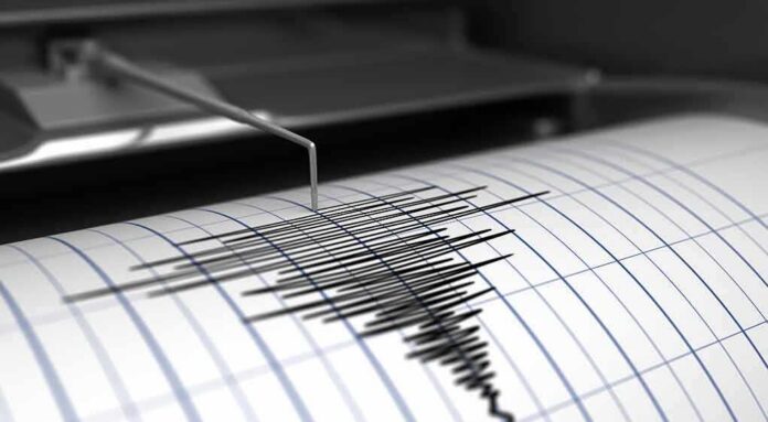 shutterstock_415252909 Seismograph needle recording earthquake waves on paper