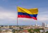 Stolen Votes? Petro Drops Explosive Claim Colombian flag waving over a coastal city skyline