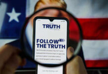 Phone screen displaying Truth Social app magnified