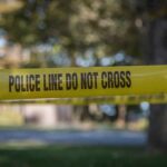 58 Victims Flagged – Five Women Feared Dead yellow police tape cordoning off an outdoor area
