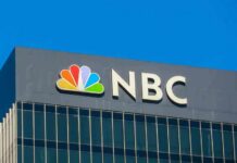 NBC logo on a modern office building facade