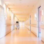 FBI Warning Ignored? Lawsuit Explodes Hospital corridor with doors and medical cart